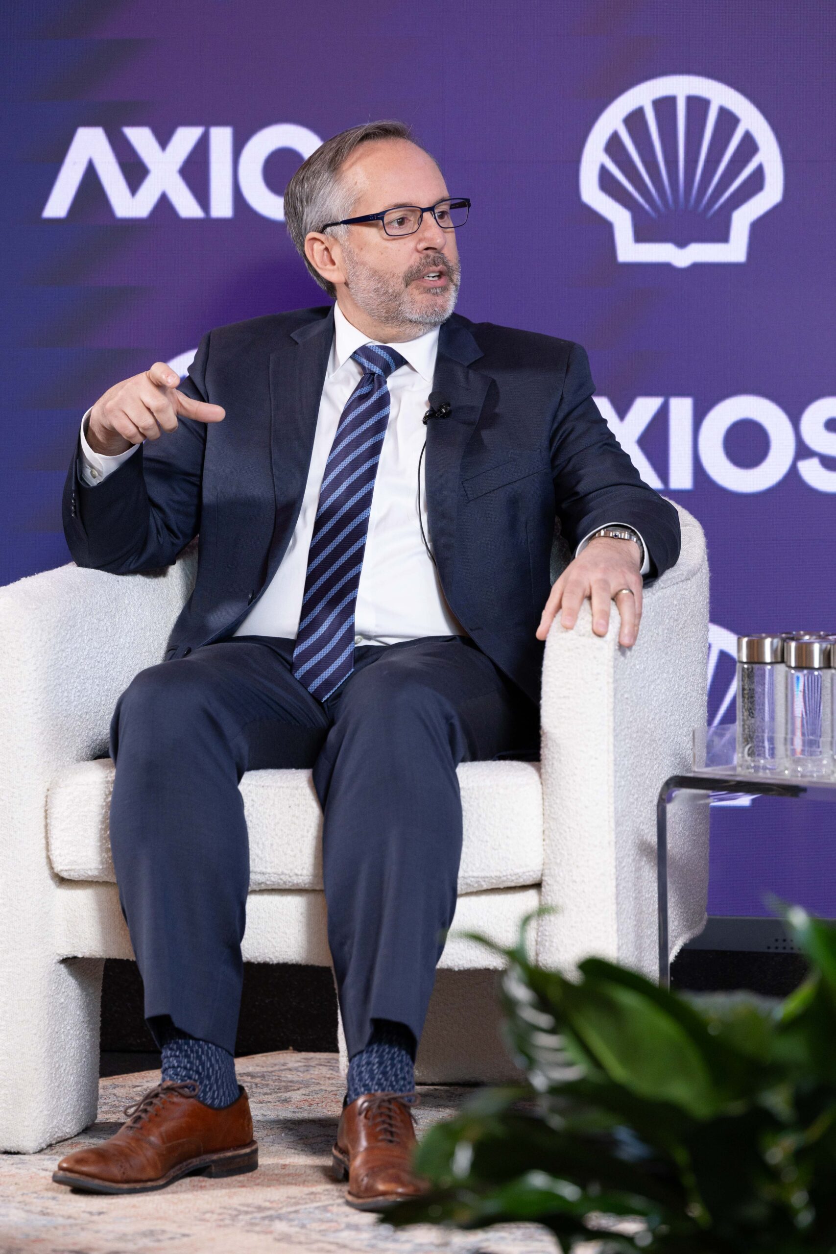 Glenn Davis speaking at an Axios event